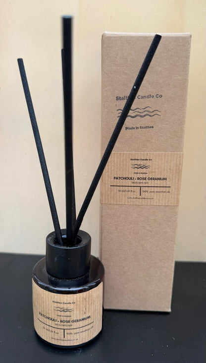 Patchouli & Rose geranium 50l amber glass jar with black lid and reeds