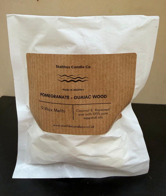 pomegranate & guaiac wood wax melts pack of 9 white gasoline bag with brown label