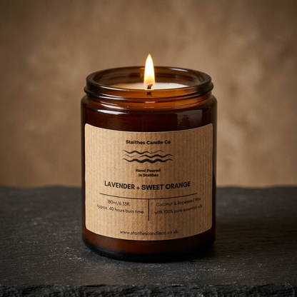 Warm lit Lavender & Sweet Orange candle